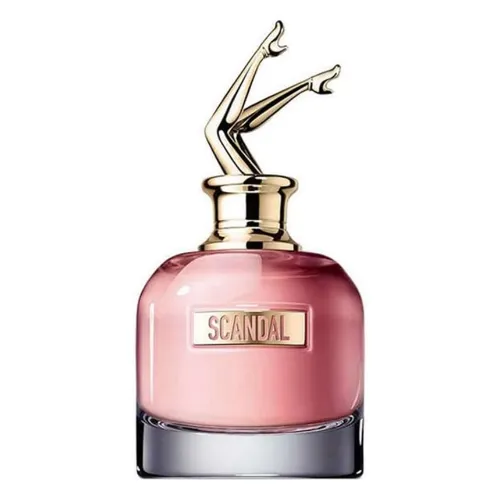 Frasco de perfume feminino importado rosa com tampa com pernas femininas no alto